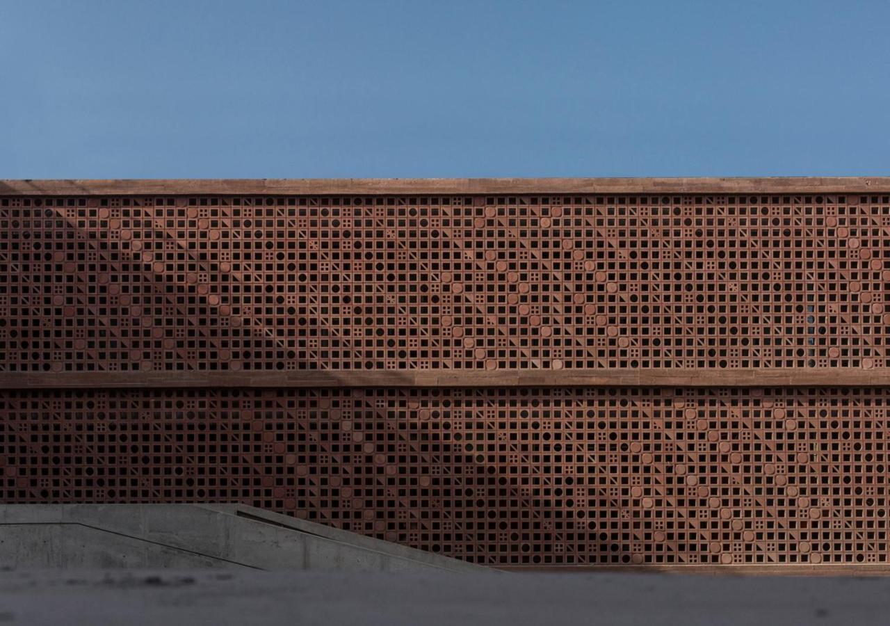 Potato Head Suites & Studios Seminyak Exterior foto The perforated brick facade